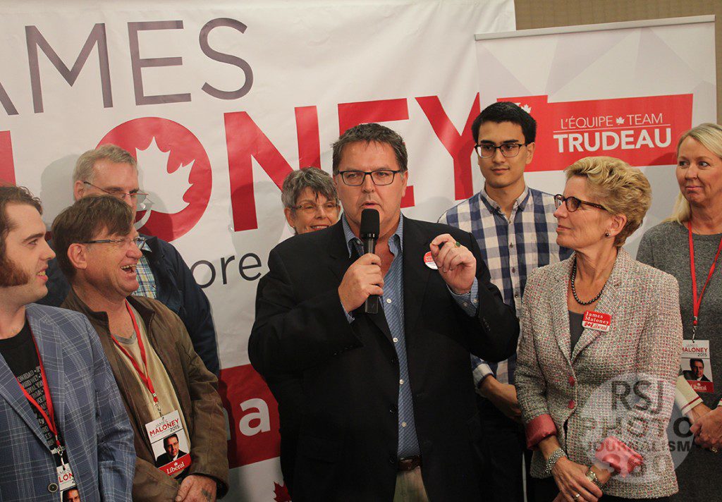 Etobicoke-Lakeshore Liberal Candidate James Maloney speaks in his campaign office beside Premier Kathleen Wynne on October 13th, 2015. 